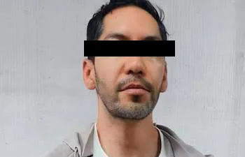 Detienen en el AICM a implicado en fraude millonario con criptomonedas